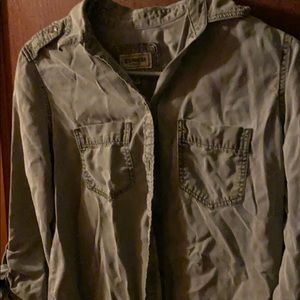 distressed green shirt